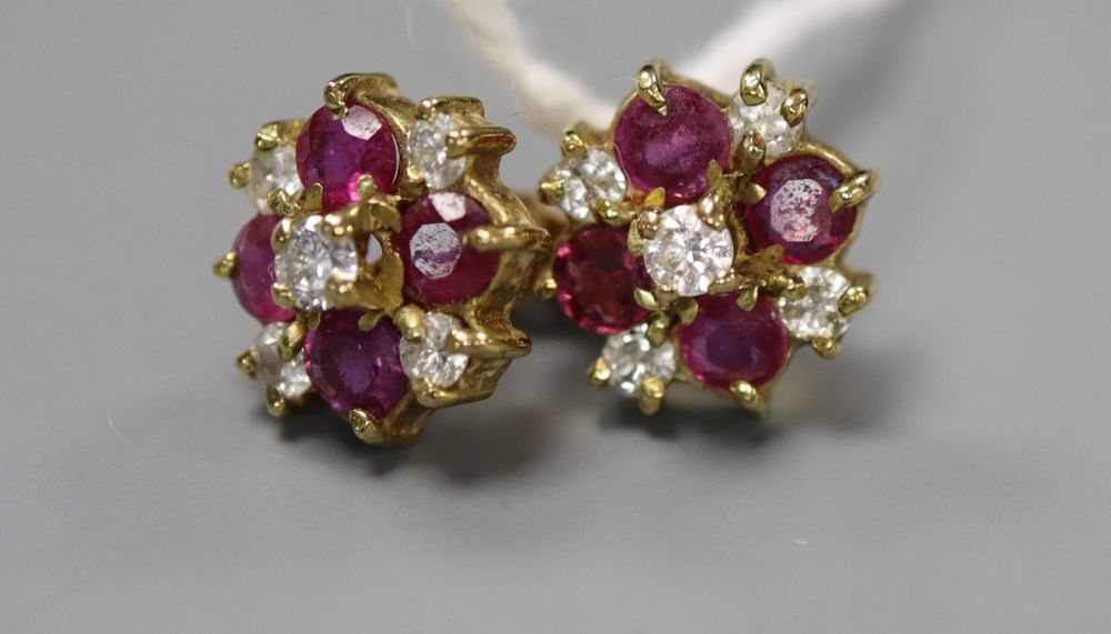 A pair of modern 9ct gold, ruby and diamond cluster ear studs, 9mm, gross 2.1 grams.